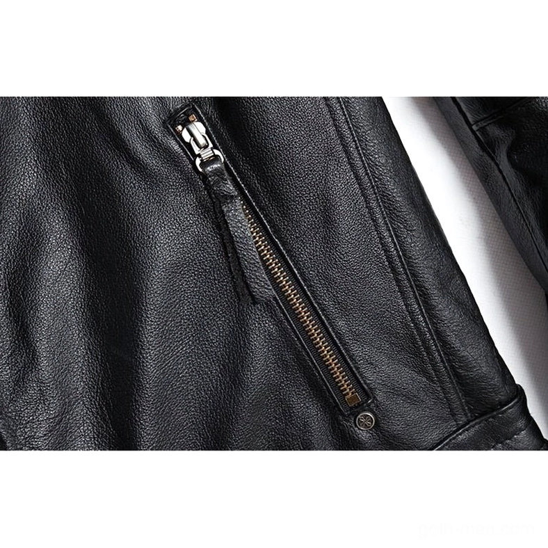 Metal zipper pocket detail on black leather gothic motorcycle jacket with leather pull tab