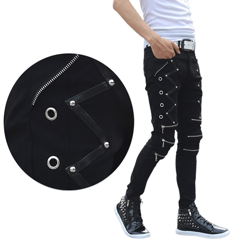 Black gothic biker jeans close-up detail of leather straps metal eyelets and zipper hardware