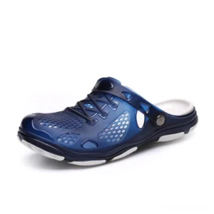 Men's deep ocean blue translucent gothic jelly clog with white rubber outsole, side profile view showcasing minimalist silhouette