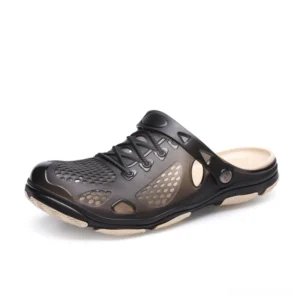 Men's dark charcoal gothic jelly sandal clog with translucent EVA upper and ventilation design, three-quarter side view
