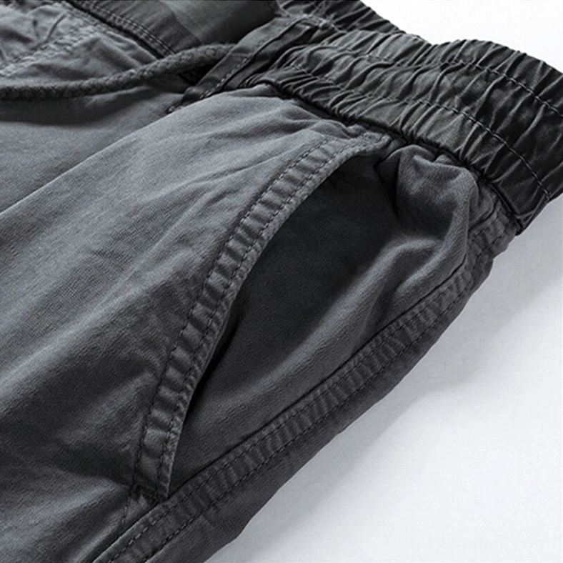 Soft cotton elasticated waistband detail of gothic cargo joggers side view
