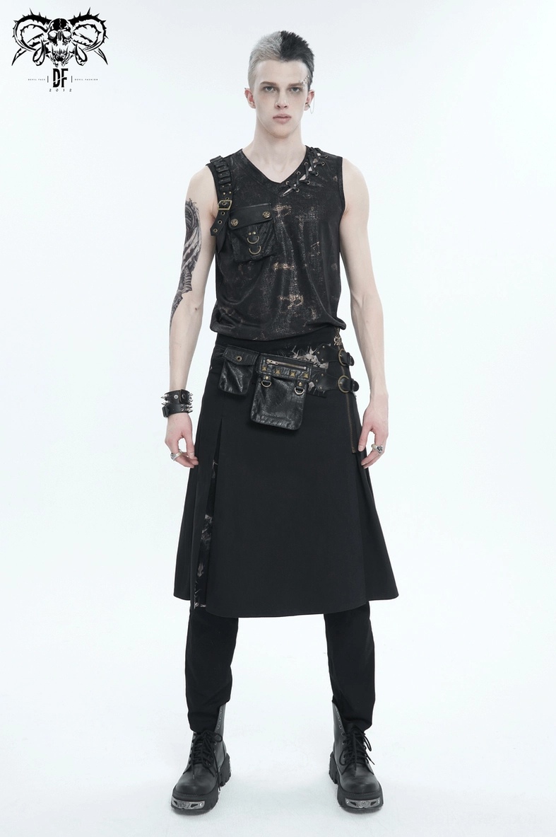 Full body styling shot of tattooed male model wearing complete gothic ensemble with tie-dye studded kilt, studded vest, matching waist bag, and combat boots