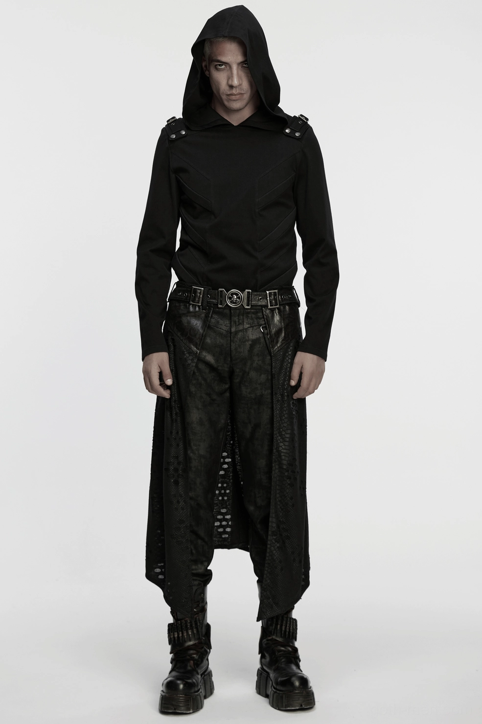 Detailed view of gothic kilt construction showing faux leather panels and tattered knit segments
