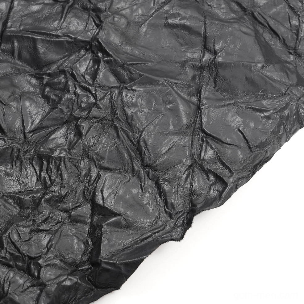 Black crinkled leather gothic kilt front detail showing waist buckle configuration and crinkled synthetic leather texture