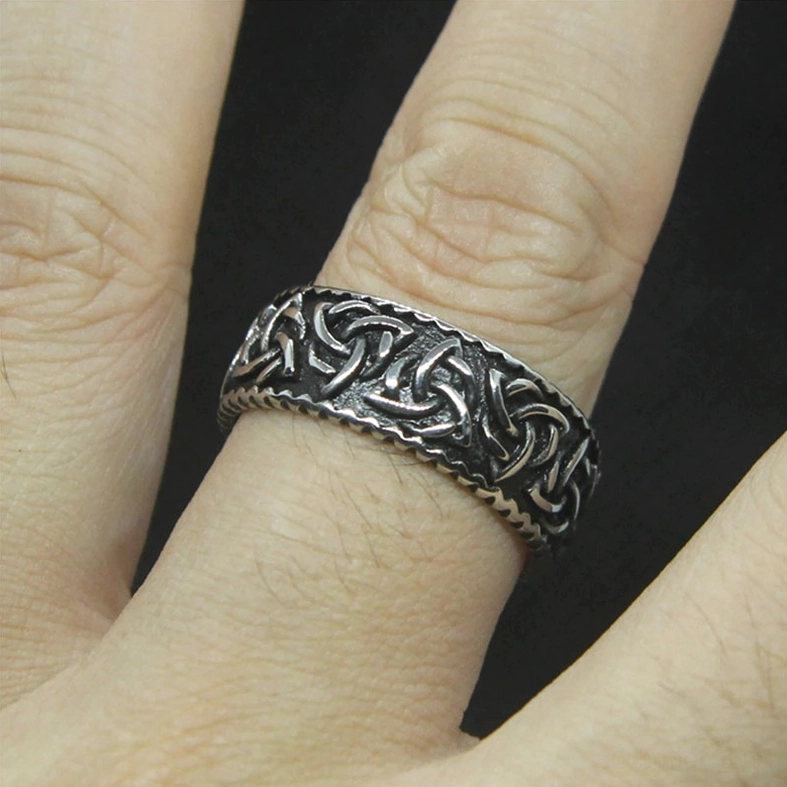 Close-up right side view of gothic Viking Celtic knot stainless steel ring with full outer pattern visible