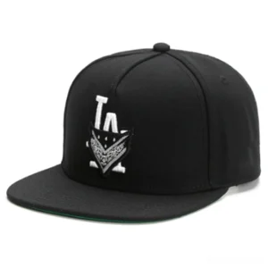 Black gothic LA embroidered snapback cap with white lettering and green inner brim detail