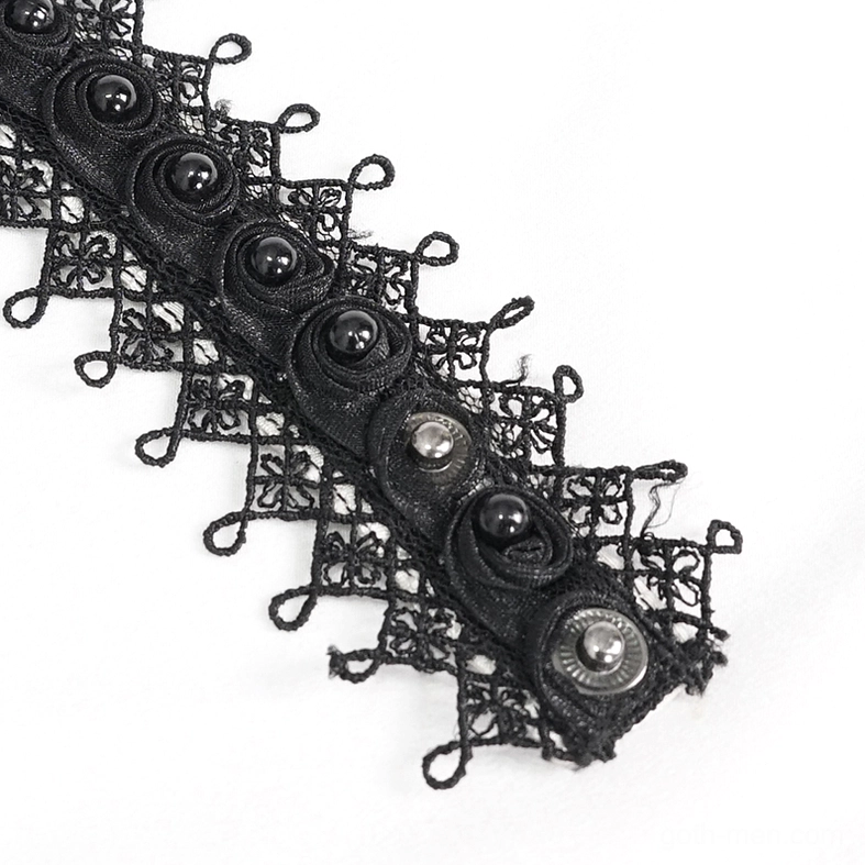 Black lace choker strap detail with round bead decorations and vintage metal trim, flat lay close-up showcasing gothic aesthetic craftsmanship