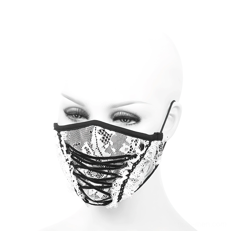 Gothic lace face mask three-quarter angle view showing fitted black and white design with elastic ear loops on mannequin