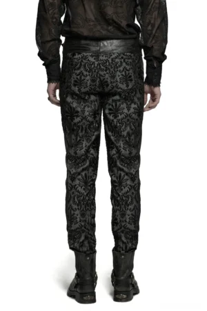Rear three-quarter view of black gothic lace pants with tapered legs and leather waist panel detail
