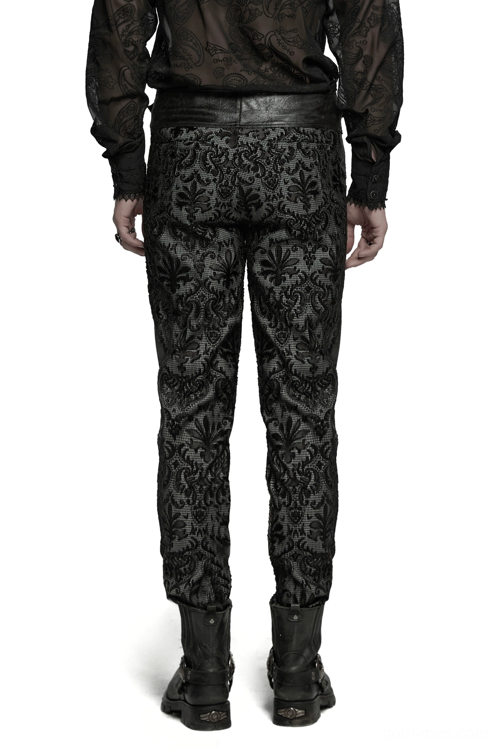 Rear three-quarter view of black gothic lace pants with tapered legs and leather waist panel detail