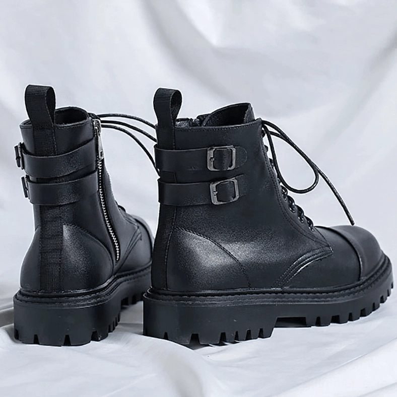 Black gothic ankle boots rear view showing pull tab and metal buckles