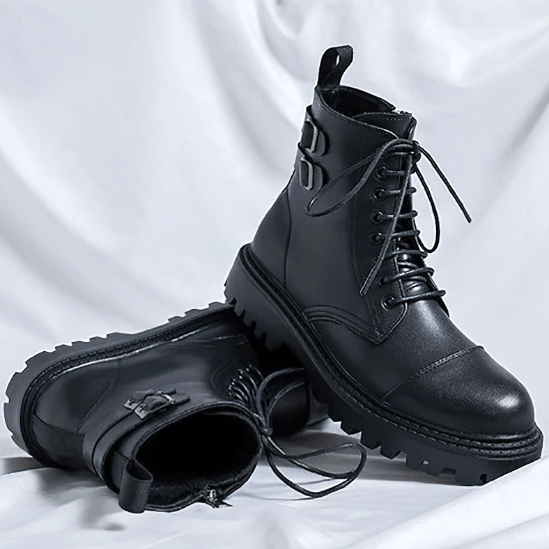Black gothic ankle boots angled view showing side zipper and lugged rubber sole