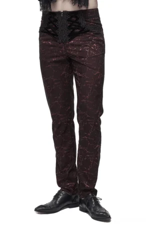 Men's wine red gothic lace-up pants with distressed crack print, front-facing view on model, showing fitted silhouette and decorative lace waist detail