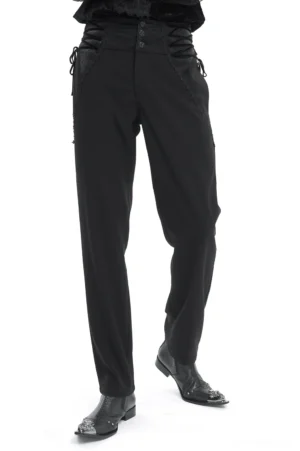 Black gothic high-waisted trousers with ornate patterned buttons and side lace-up waist detail, front three-quarter view on model