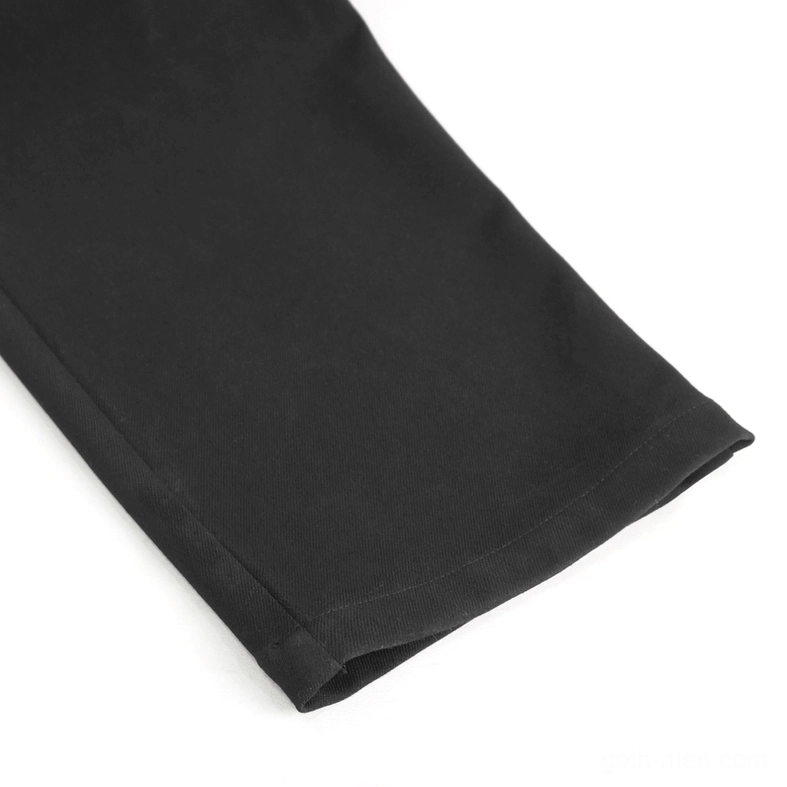 Black gothic high-waisted trousers full-length side profile showing ornate waist elements and fitted silhouette