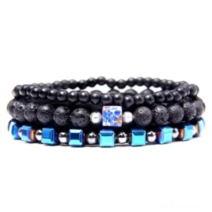 Layered gothic charm bracelet featuring natural stone beads, matte black elements, and celestial blue square accents with metallic details – handmade multi-tier beaded bracelet for alternative style and gothic fashion