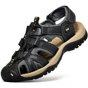 Gothic black leather ankle strap sandals for men, three-quarter view showing closed-toe design and anti-slip rubber outsole