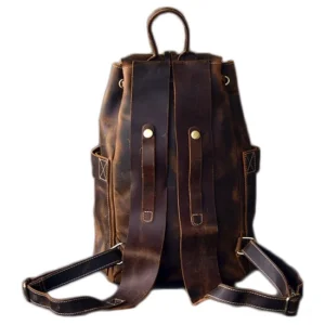 Vintage leather gothic backpack rear view showing padded shoulder straps and metal rivet embellishments