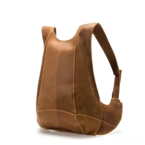 Vintage tan leather gothic backpack rear three-quarter angle light brown streamlined paneled construction