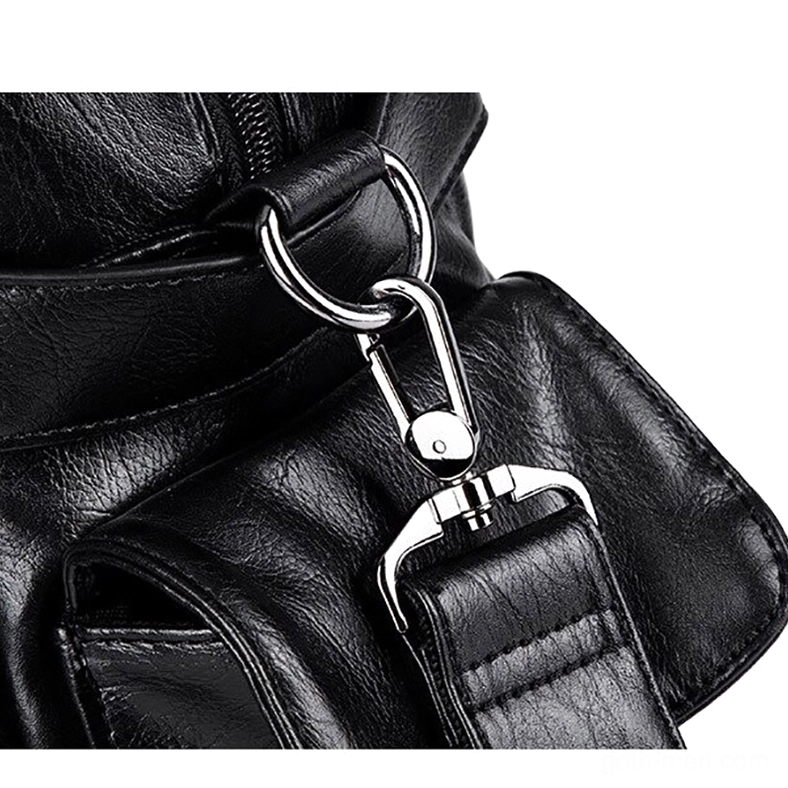 Leather gothic bag hardware close-up featuring silver metal carabiner clip and stitched strap attachment