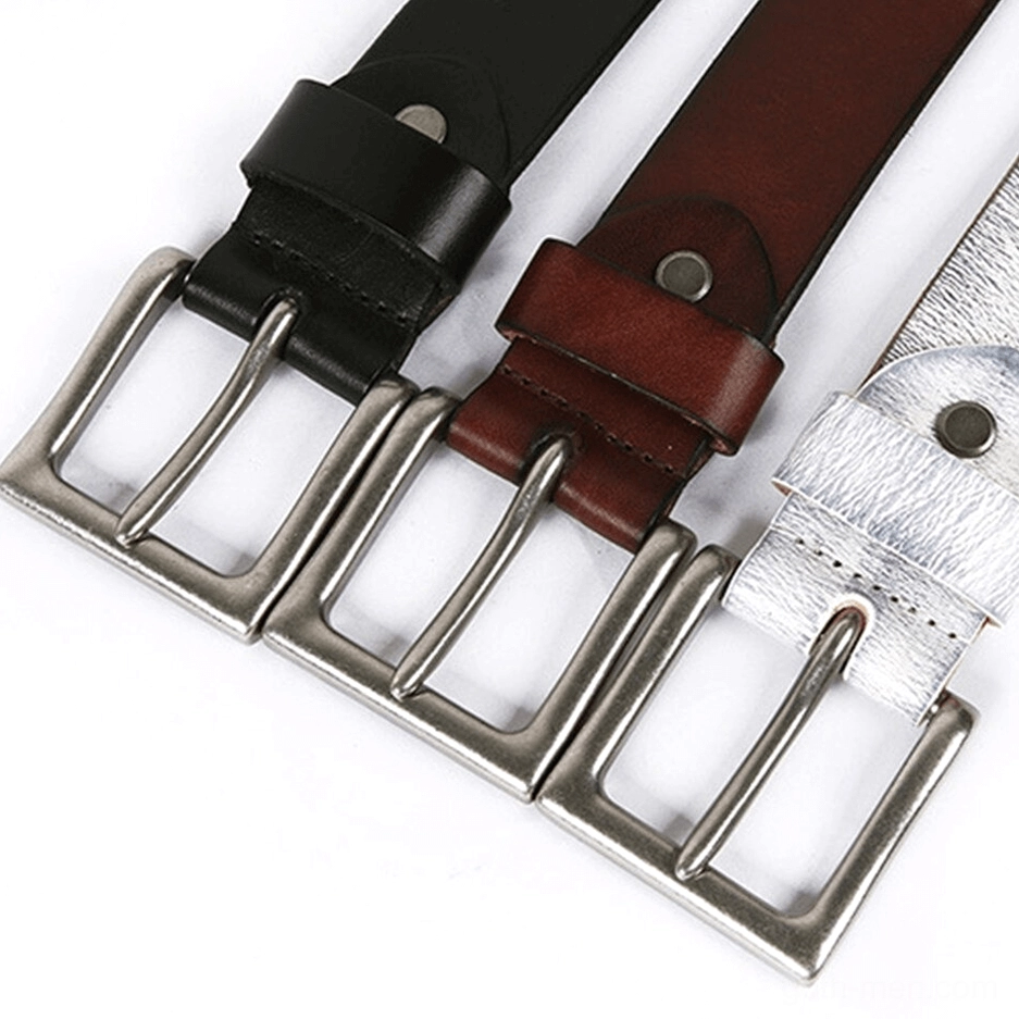 Three assorted gothic leather belts in black brown and white with matching silver pin buckles