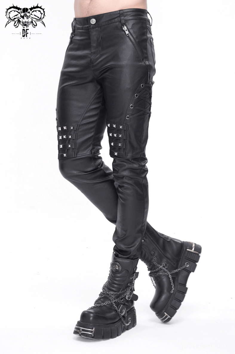 Full length styling view of black gothic leather biker pants with alternative aesthetic