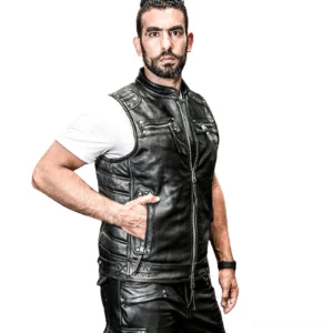 Black genuine leather gothic biker vest with metal hardware front three-quarter view
