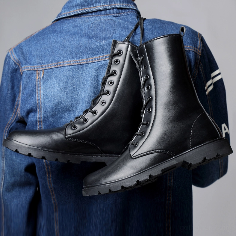 Men's black gothic combat boots detail shot – genuine leather upper with stitching and heel pull tab