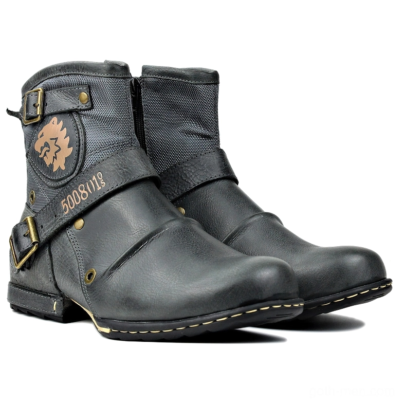 Pair of men's gothic leather boots with dual buckle straps and lion emblems, front group shot