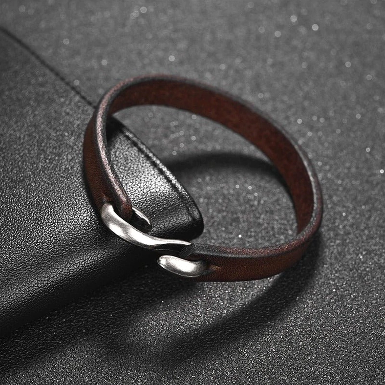Dark brown distressed genuine leather gothic bracelet with natural grain and vintage metal boat hook clasp
