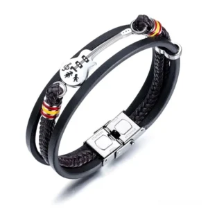 Electric guitar charm leather bracelet with red and yellow striped metal ring detail on multilayer black leather – gothic jewelry