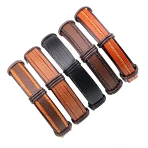 Individual brown leather gothic bracelets with stitched edges and layered rope chain construction detailed view