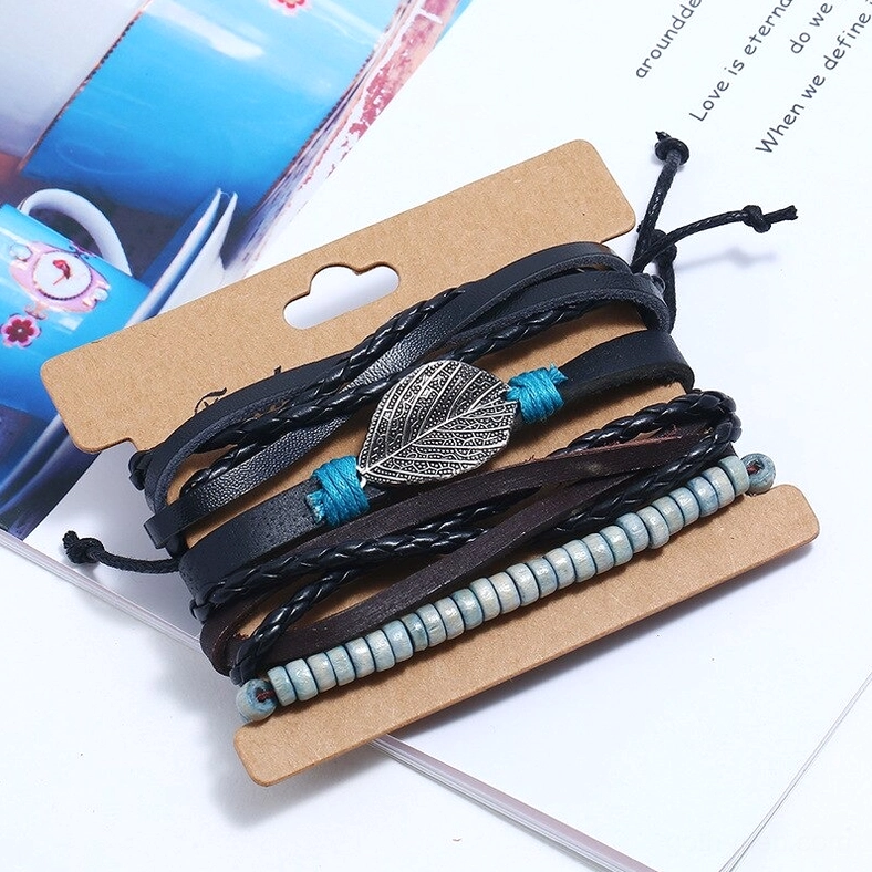 Gothic leather bracelet set in cardboard hang tag packaging ready for gift giving