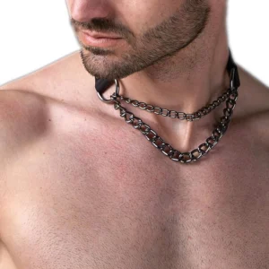 Gothic men's dual chain neck harness with metal curb chains and leather collar, front view close-up