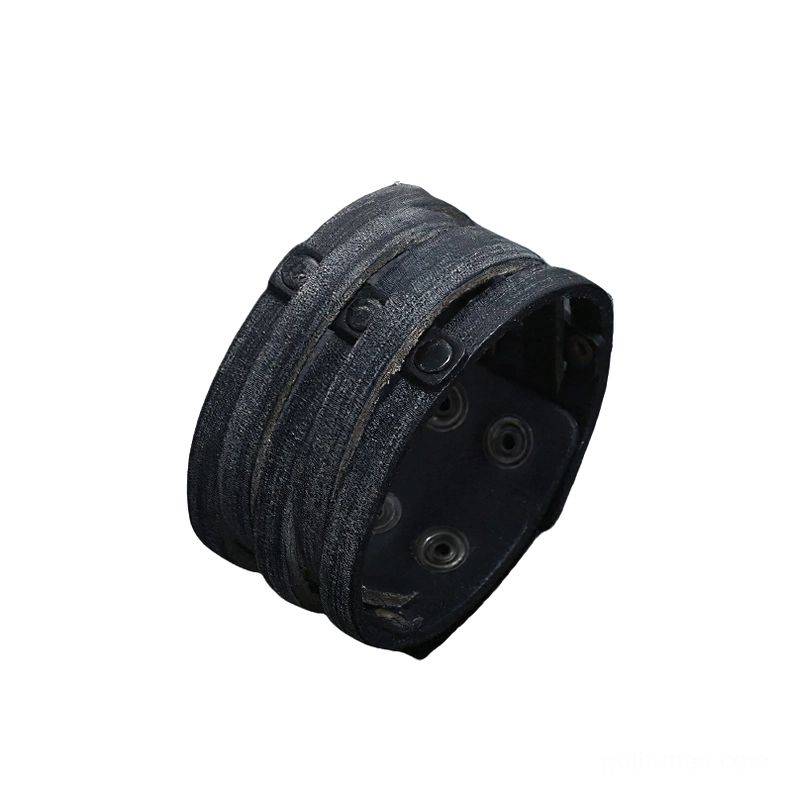 Black leather gothic cuff bracelet rear view showing adjustable snap fasteners and metal hardware from the back side