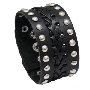 Black gothic leather wide cuff bracelet with handwoven braided strap and metal rivet studs, top-side view