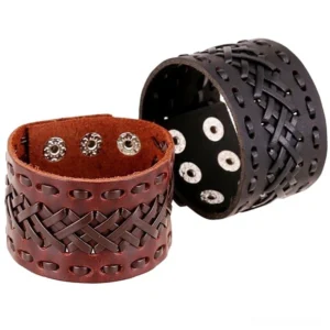 Flat lay comparison of black and brown gothic braided leather wide cuff bracelets displayed on white background, showing metal snap fasteners