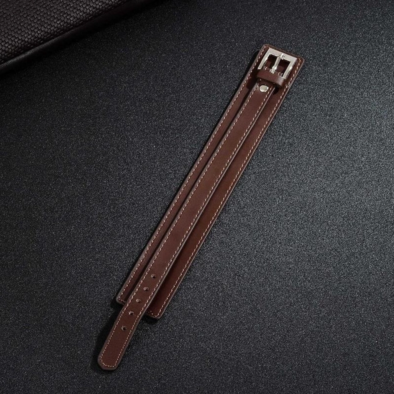 Unassembled gothic leather cuff bracelet straps showing double-layer construction with stainless steel buckle