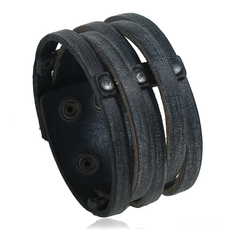 Black distressed leather gothic cuff bracelet with metal rivets and studs - front close-up view showing detailed rivet placement and wide leather design