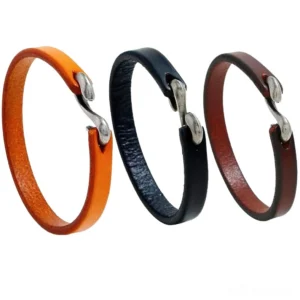 3-piece genuine leather gothic cuff bracelet set with hook clasps - black, wine red, and camel colors on white background