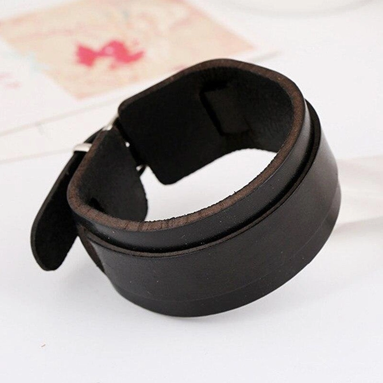black leather gothic cuff bracelet side back view with adjustable strap and soft suede inner layer
