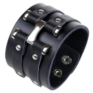 Side view of gothic leather cuff bracelet showing snap fasteners and construction detail