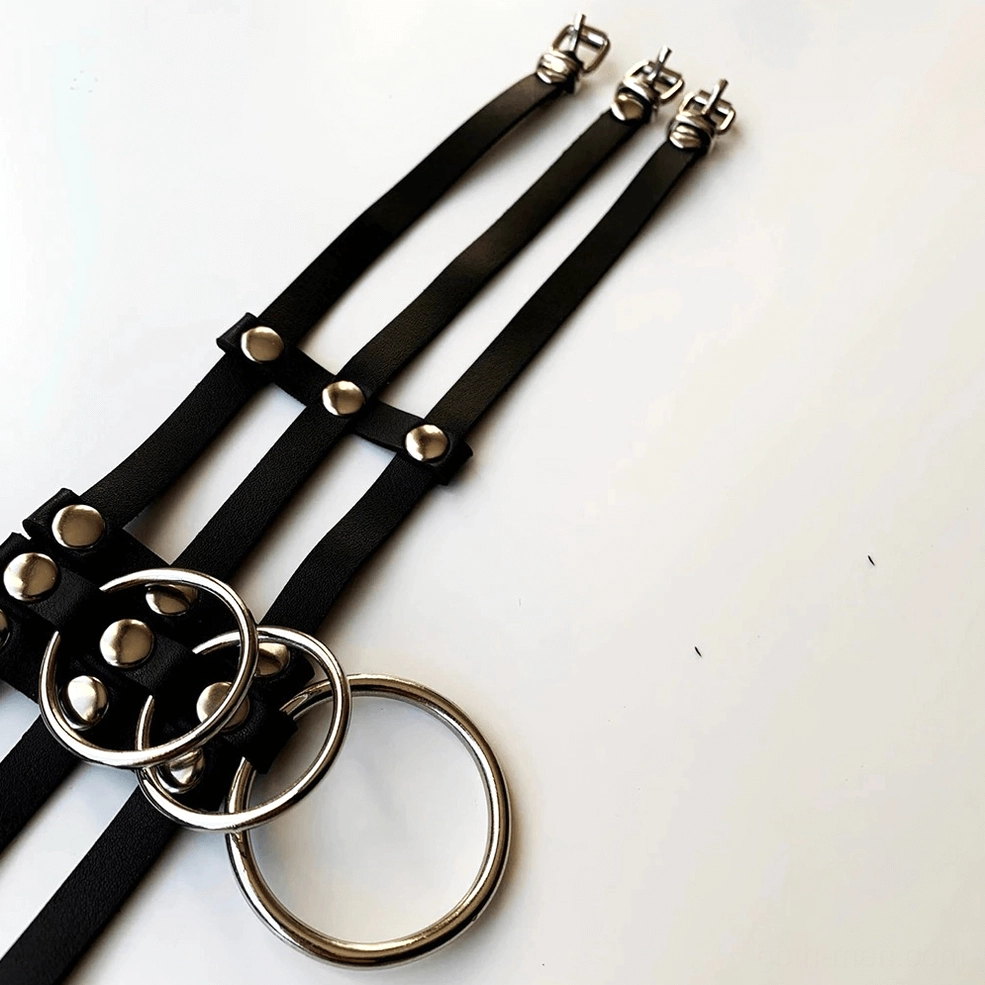 Alternative black gothic harness style variant with unique strap configuration and metal accents