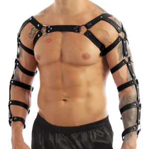 Men's black gothic leather chest harness with full arm straps front view worn by muscular tattooed model