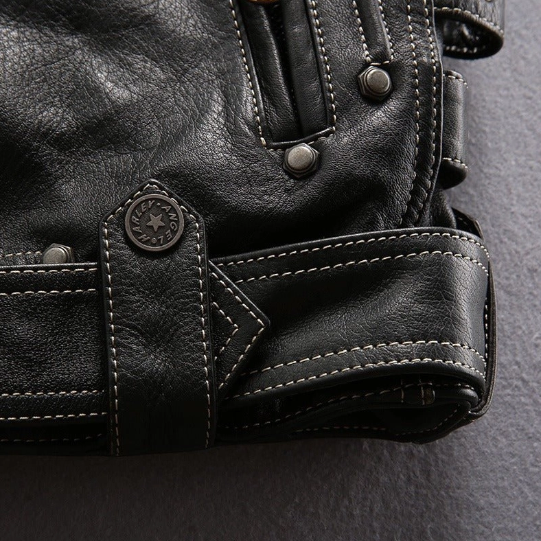 Black genuine leather gothic motorcycle jacket, texture and material quality close-up view of genuine cow leather