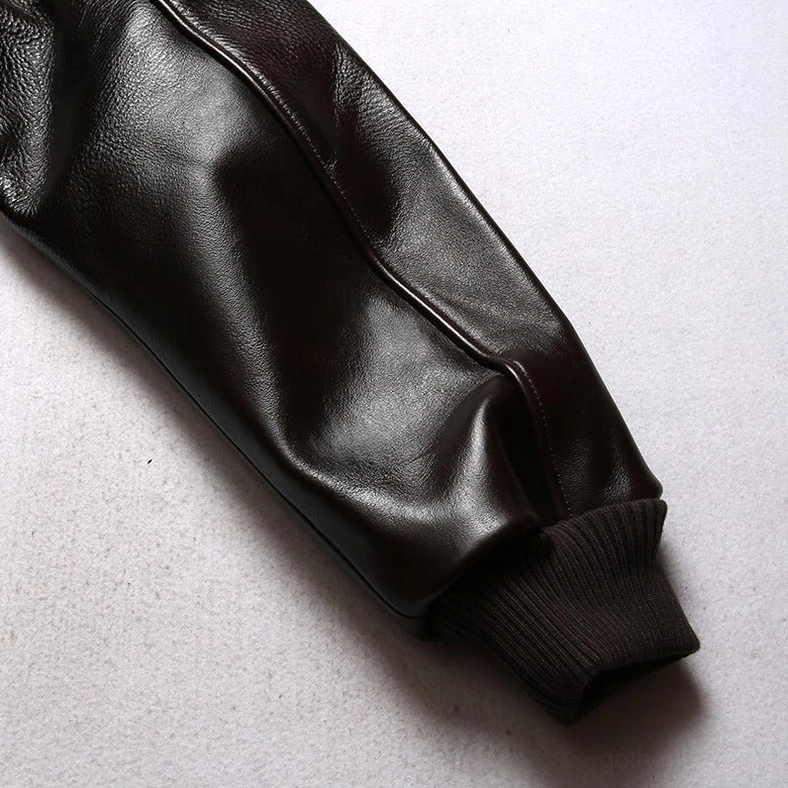 Layered zipper system on gothic leather flight jacket showing industrial design and functionality