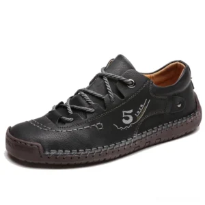 Black gothic leather lace-up loafers for men, side three-quarter studio view showing hand-stitched details and premium leather construction