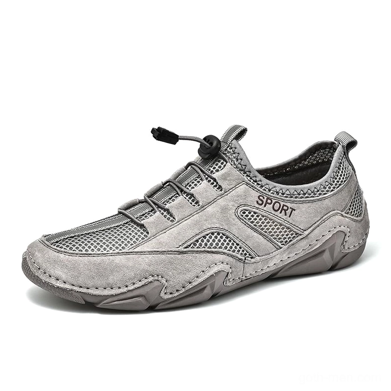Grey leather gothic sneaker with mesh inserts and toggle lace closure - left side front view