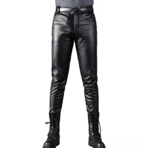 Men's black gothic faux leather skinny pants with zippers front view, displayed on male model wearing combat boots and leather belt