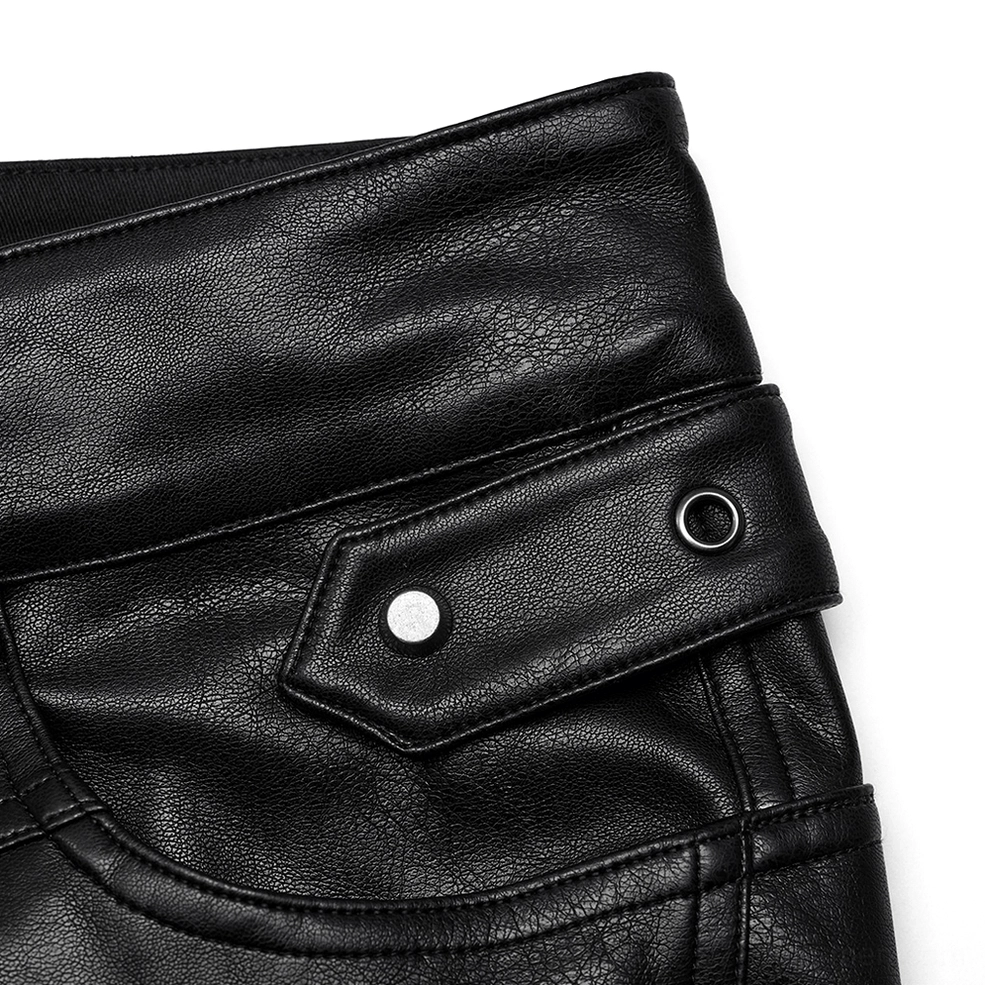 Close-up side pocket detail of black gothic leather pants with flap snap pocket and metal snap fastener hardware